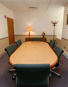 Conference room seats six